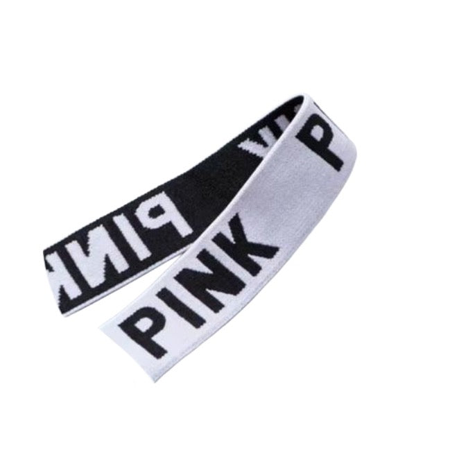 Women's Sports Bra. Black with white letters “PINK”. Stretchy. Wide shoulder straps
